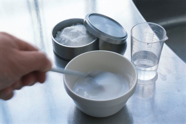 Create a paste by mixing water with bicarbonate soda