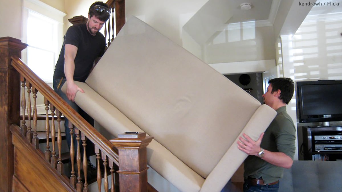 How can you move a heavy couch upstairs?