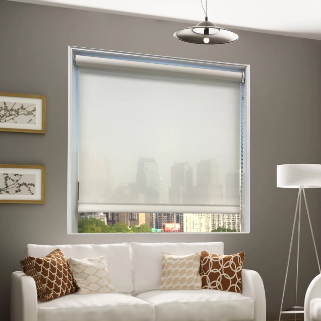 Reflective solar shades for UV protection and heat reduction in indoor spaces