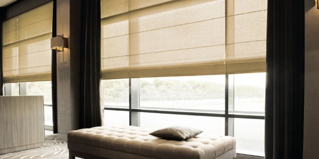 Using soft window treatments can effectively diminish the intense glare caused by bright sunlight.