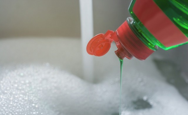 Mix a mild detergent solution with lukewarm water