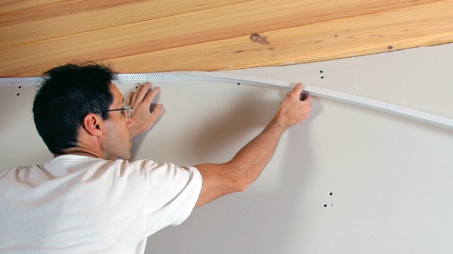 How To Hang Art On Slanted Walls: Assess the Wall Angle and Size