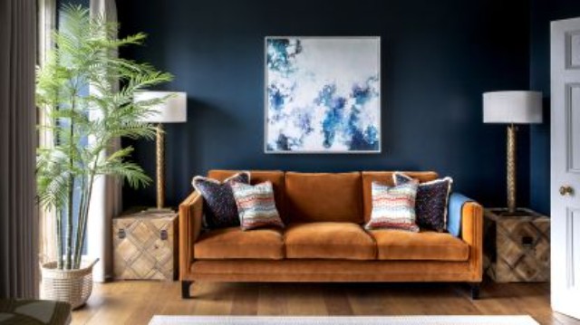 Contrast a brown sofa with cool blues
